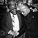 Chicago mayor Harold Washington comforts Friar George Clements at the scene of the famous Holy Angels Church fire in 1986.