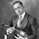 Dyett and his violin in Pasadena, Calif in 1915.
